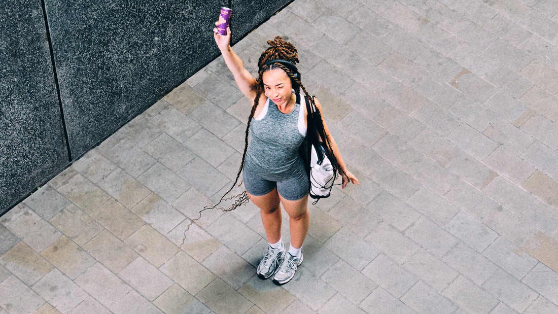 Ella Eyre holding can of INTUNE CBD drink